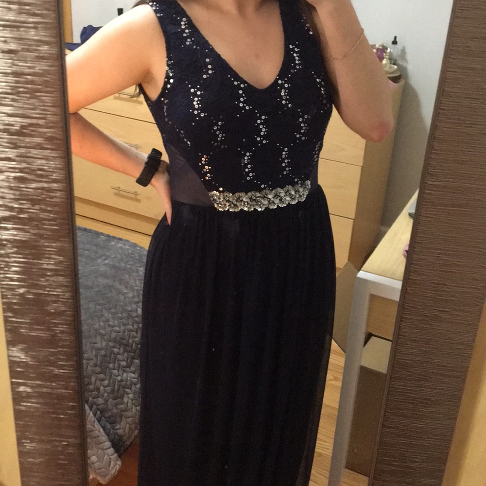 Navy blue sequined long dress.